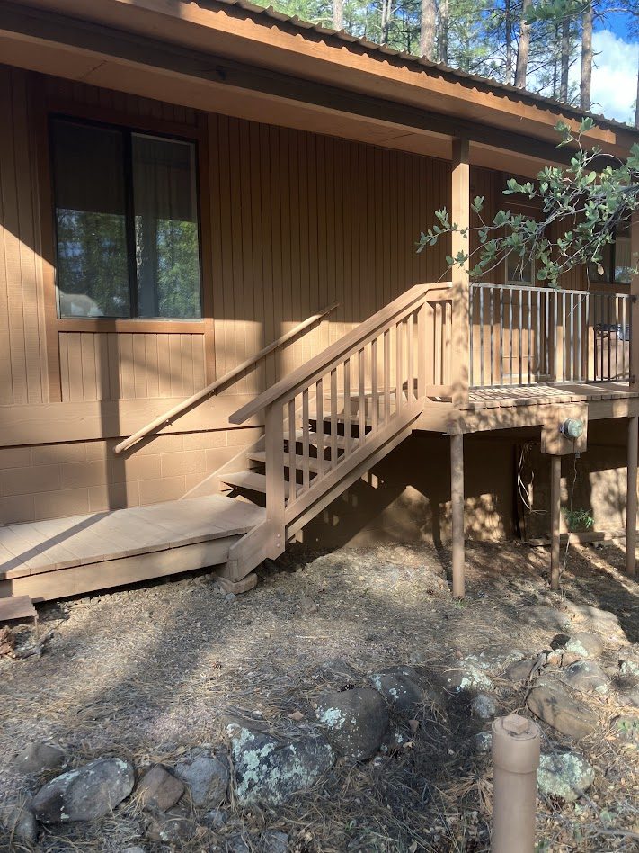 New railing on a deck built by Gila Home Solutions in Pine, Arizona